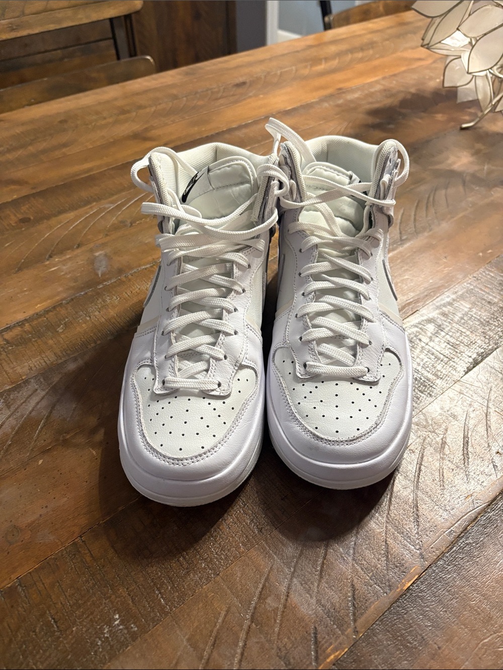 Nike women’s White High-Top Sneakers with Subtle Stitch Detail